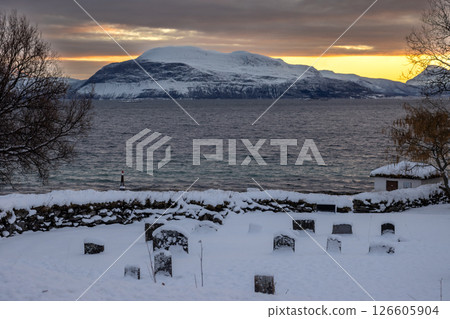 Cemetery and Norwegian sea in the sunrise, Norway 126605904