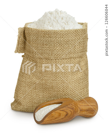 White flour in a paper bag and wooden scoop isolated on white background White flour in a paper bag and wooden scoop isolated on white background 126606844