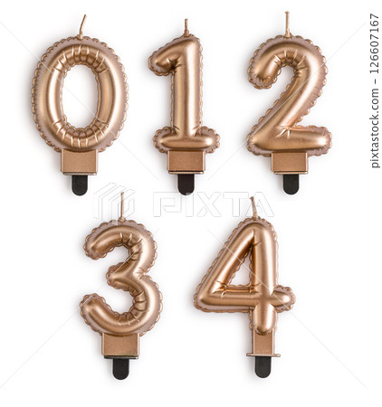 Golden cake candles in shape of numbers Golden cake candles in shape of numbers 126607167