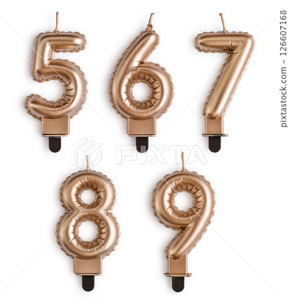 Golden  cake candles in shape of numbers 126607168