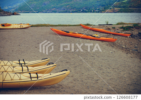 Kayaks on fjord shore, Flam, Norway 126608177