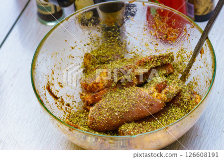 Meat with spices in bowl Meat with spices in bowl 126608191