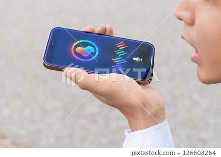 The hands of a business person using a voice input app 126608264