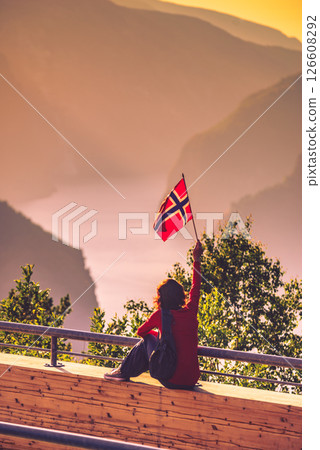 Tourist enjoy fjord view on Stegastein viewpoint Norway 126608292