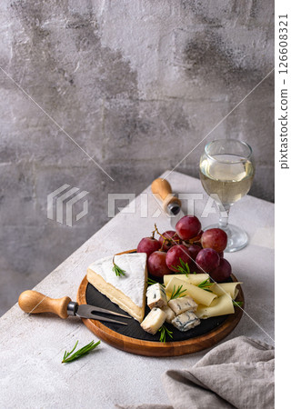 Different types of cheese, wine and grapes Different types of cheese, wine and grapes 126608321