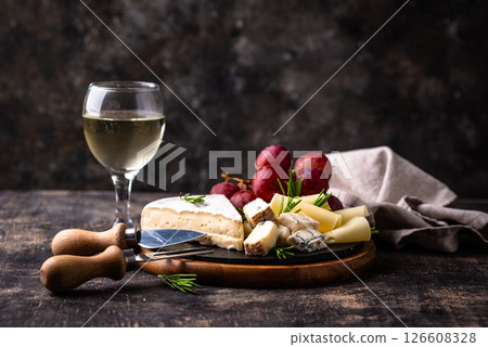 Different types of cheese, wine and grapes Different types of cheese, wine and grapes 126608328
