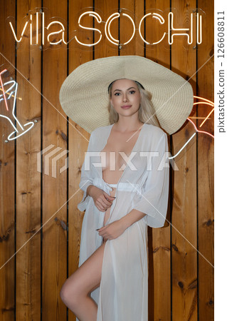 Relaxing woman enjoys tranquility in sauna at Villa Sochi spa 126608811