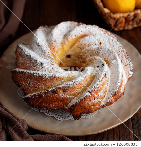 Lemon bundt cake powdered sugar on wooden table 126608835