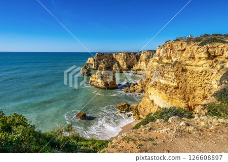 Praia da Marinha Beach among rock islets and cliffs seen from Seven Hanging Valleys Trail, Algarve, Portugal 126608897