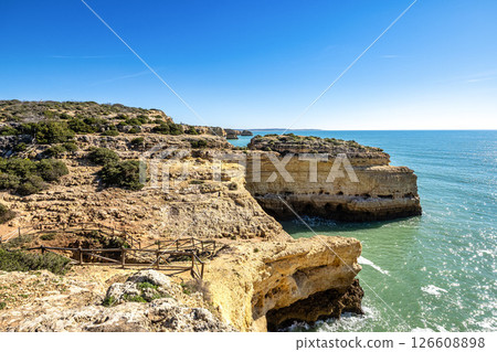 Praia da Marinha Beach among rock islets and cliffs seen from Seven Hanging Valleys Trail, Algarve, Portugal 126608898