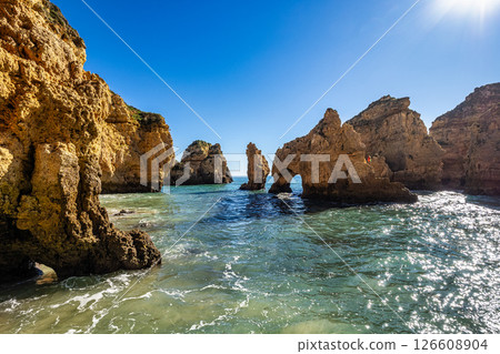 Ponta da Piedade is a unique rock formation with famous grottos in the ocean at Lagos, Algrave, Portugal Ponta da Piedade is a unique rock formation with famous grottos in the ocean at Lagos, Algrave, Portugal 126608904