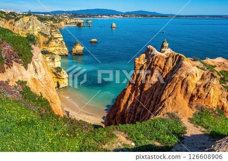 Ponta da Piedade is a unique rock formation with famous grottos in the ocean at Lagos, Algrave, Portugal Ponta da Piedade is a unique rock formation with famous grottos in the ocean at Lagos, Algrave, Portugal 126608906