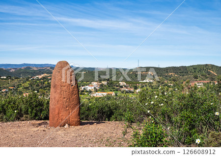 Sandstone Menir dating from 6000-4500 BC in the dry hills near Vale Fuzeiros, Algarve, Portugal. 126608912
