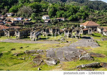 The communitarian granaries, called espigueiros, in the village of Lindoso, Peneda National Park, Northern Portugal 126608928
