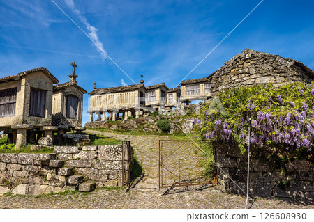 The communitarian granaries, called espigueiros, in the village of Lindoso, Peneda National Park, Northern Portugal 126608930