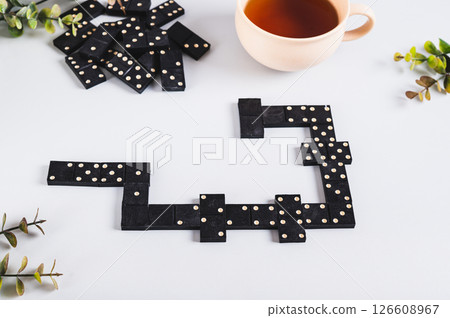 Traditional black dotted dominoes for table game 126608967