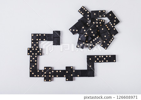 Close up of a calm domino board game for leisure on the table top view Close up of a calm domino board game for leisure on the table top view 126608971