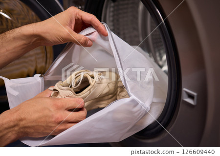Washing Shoes in a Laundry Bag is an innovative method for efficiently cleaning your footwear 126609440