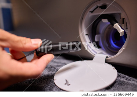 A closeup view of an illuminated technology interface showcasing advanced features and design 126609449