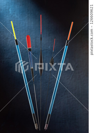 Several different floats. Fishing floats of various shapes. Promotional photo of floats. Several different floats. Fishing floats of various shapes. Promotional photo of floats. 126609621