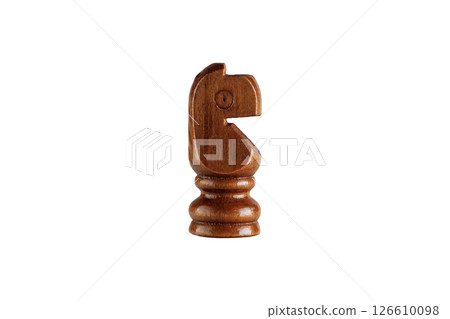 wooden brown knight chess piece on white background. Ideal for strategy and gaming concepts. wooden brown knight chess piece on white background. Ideal for strategy and gaming concepts. 126610098