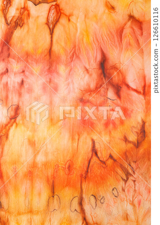 abstract pattern on silk fabric texture in yellow and brown tones abstract pattern on silk fabric texture in yellow and brown tones 126610116