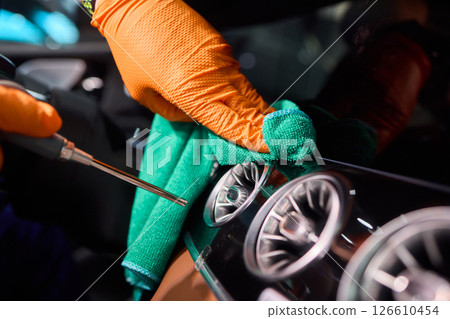 Properly Cleaning Your Car Interior Using Microfiber Cloths and Protective Gloves is Important Properly Cleaning Your Car Interior Using Microfiber Cloths and Protective Gloves is Important 126610454