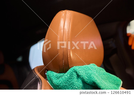 Demonstration of an Expert Car Interior Cleaning Process in Action with Every Detail Considered Demonstration of an Expert Car Interior Cleaning Process in Action with Every Detail Considered 126610491