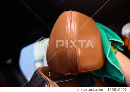 Demonstration of an Expert Car Interior Cleaning Process in Action with Every Detail Considered Demonstration of an Expert Car Interior Cleaning Process in Action with Every Detail Considered 126610492