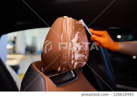 Demonstration of an Expert Car Interior Cleaning Process in Action with Every Detail Considered Demonstration of an Expert Car Interior Cleaning Process in Action with Every Detail Considered 126610493