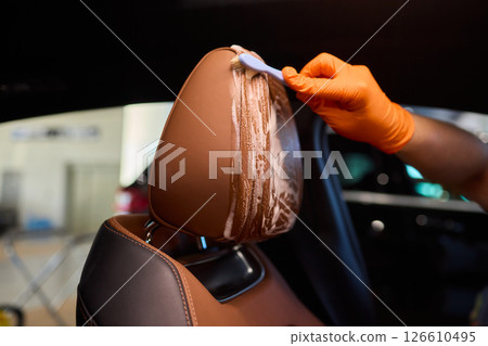 Demonstration of an Expert Car Interior Cleaning Process in Action with Every Detail Considered Demonstration of an Expert Car Interior Cleaning Process in Action with Every Detail Considered 126610495