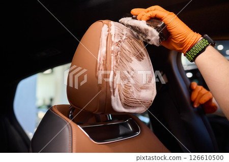 Demonstration of an Expert Car Interior Cleaning Process in Action with Every Detail Considered 126610500