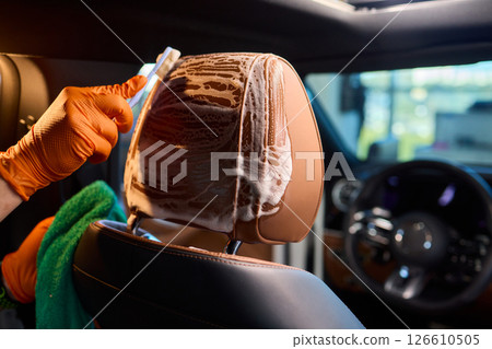 Demonstration of an Expert Car Interior Cleaning Process in Action with Every Detail Considered 126610505