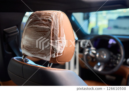Demonstration of an Expert Car Interior Cleaning Process in Action with Every Detail Considered 126610508