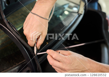 Our experts offer quality automotive glass installation services, ensuring safety for every vehicle Our experts offer quality automotive glass installation services, ensuring safety for every vehicle 126610532