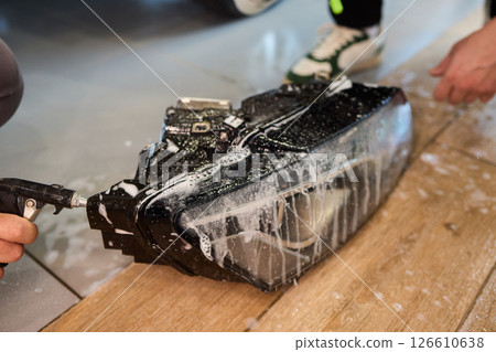 Cleaning and Properly Maintaining Automotive Parts to Ensure Their Longevity and Functionality 126610638