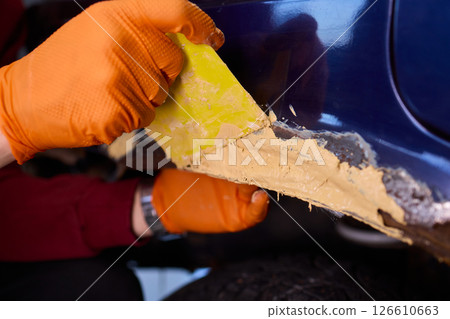 The Auto Body Repair Process includes proper Putty Application techniques and effective methods The Auto Body Repair Process includes proper Putty Application techniques and effective methods 126610663
