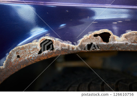 The Auto Body Repair Process includes proper Putty Application techniques and effective methods 126610756
