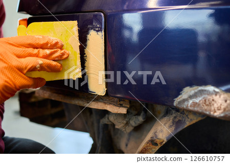 The Auto Body Repair Process includes proper Putty Application techniques and effective methods The Auto Body Repair Process includes proper Putty Application techniques and effective methods 126610757