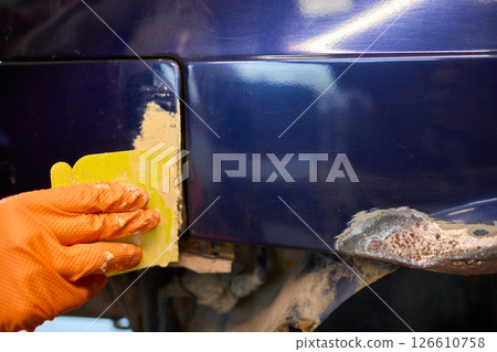 The Auto Body Repair Process includes proper Putty Application techniques and effective methods The Auto Body Repair Process includes proper Putty Application techniques and effective methods 126610758