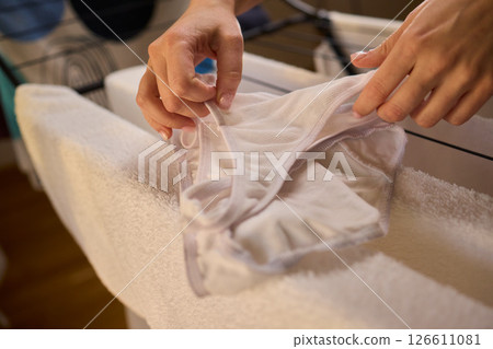 Laundry Day Freshly Cleaned Underwear Elegantly Hanging Outside to Dry in the Sun Laundry Day Freshly Cleaned Underwear Elegantly Hanging Outside to Dry in the Sun 126611081