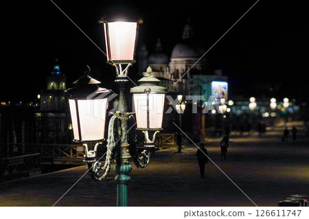 Street lamp with Santa Maria delle Salute church in the background, Venice, Italy Street lamp with Santa Maria delle Salute church in the background, Venice, Italy 126611747