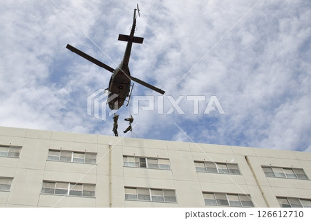 Training Demonstration UH-1 Helicopter Rappelling 6 126612710