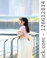 Woman looking at the view by the river 126612834