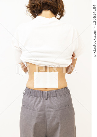 Woman's waist with a compress Woman's waist with a compress 126614194