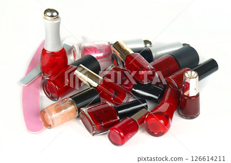 Pile of red nail polishes 126614211