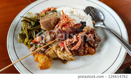 Delicious local food from Bali! Nasi Campur Delicious local food from Bali! Nasi Campur 126614762