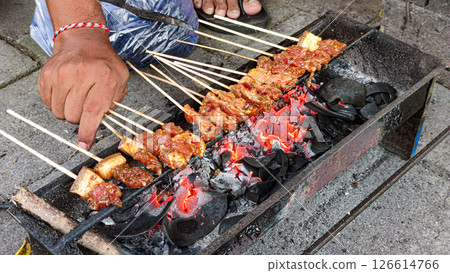 Delicious local food from Bali! Grilled pork skewers Delicious local food from Bali! Grilled pork skewers 126614766