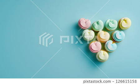 Cupcake sweet snack food love shaped on blue background Cupcake sweet snack food love shaped on blue background 126615158