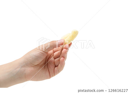 PNG, One corn stick in female hand, isolated on white background PNG, One corn stick in female hand, isolated on white background 126616227